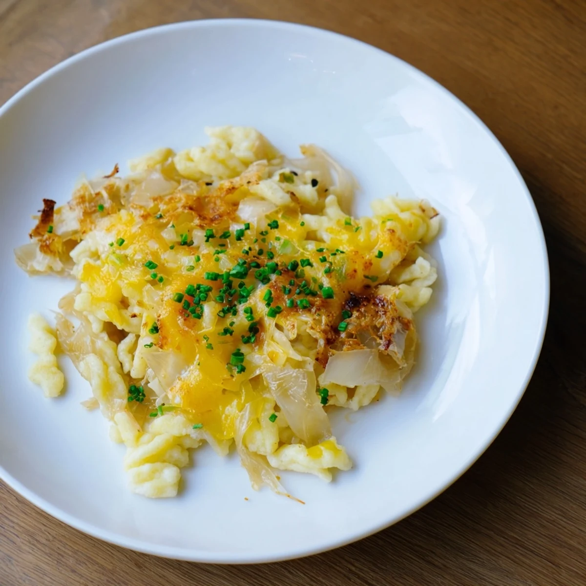 Melted cheese coats the tender spaetzle in this comforting Cheesy Spaetzle Skillet, a family favorite.