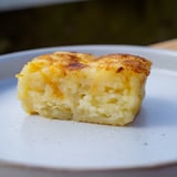 Savory The Secret 4-Ingredient Mashed Potato Cakes sizzling in the pan, a delicious way to use leftover mashed potatoes.