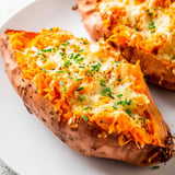 Warm, cheesy, and inviting: a close-up of a Sweet Potato & Cheese Whole Roast main course.