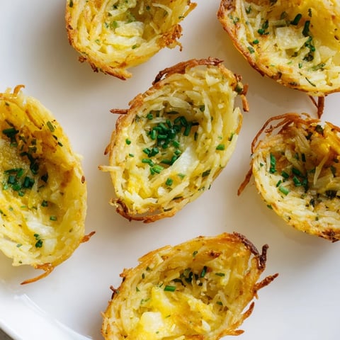 Golden-brown Crispy Potato Rösti Boats, ready to be filled with savory toppings offer great flavors.