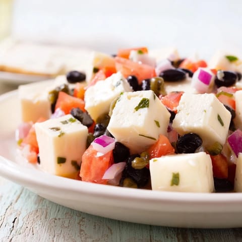 Freshly made savory bites: Pepper Jack cubes offer a spicy contrast to the vibrant black bean salsa.