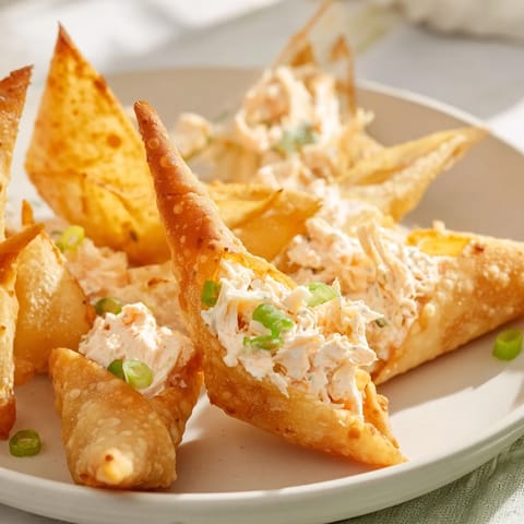 Savory and flavorful air fryer lumpia chips perfect for dipping into the chicken cream cheese.